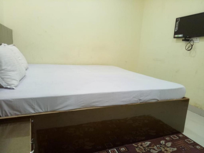 Bedroom 5, Goroomgo swastik Guest House Varanasi, Varanasi