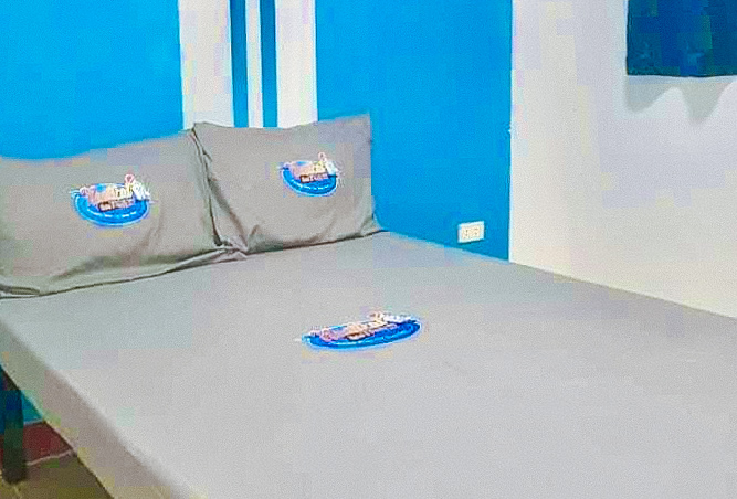 Bedroom 2, RGL Condotel Socorro by RedDoorz, Pinamalayan