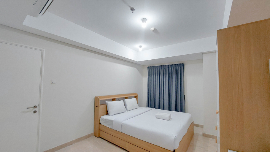 Bedroom 3, Spacious and Homey 2BR at Podomoro City Deli Medan Apartment By Travelio, Medan