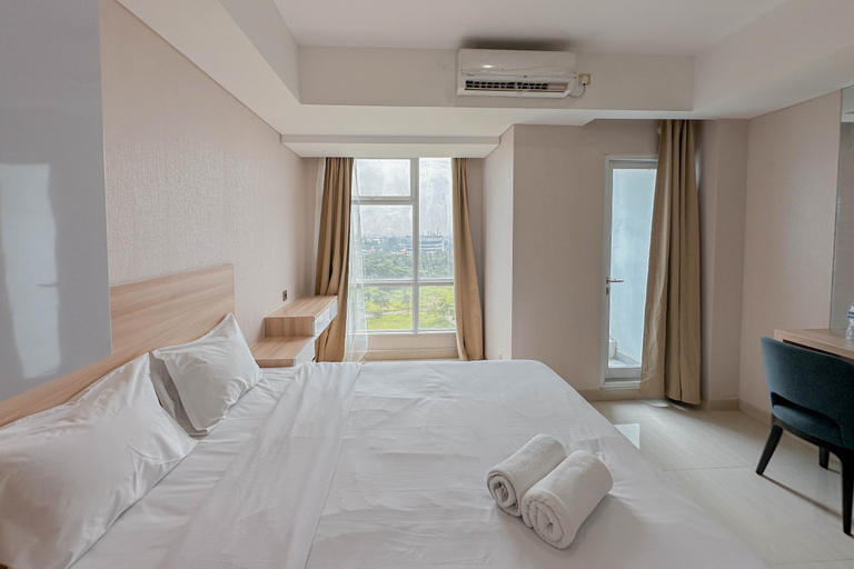 Studio Modern Style at Grand Sungkono Lagoon Apartment By Travelio, Surabaya