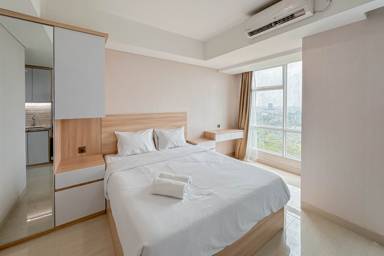 Bedroom 3, Studio Modern Style at Grand Sungkono Lagoon Apartment By Travelio, Surabaya