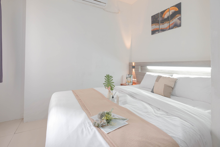 Minimalist and Well Designed 2BR Apartment with Extra Room at Vittoria Residence By Travelio, West Jakarta