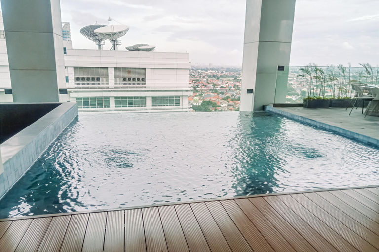 Others 3, Cozy and Elegant Studio The Smith Alam Sutera Apartment By Travelio, Tangerang