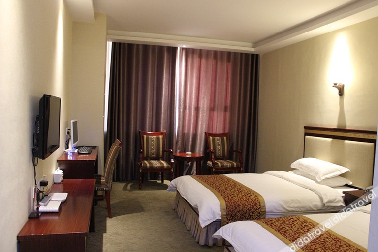Bedroom 5, クムル市新華ビジネスホテル(鉄道駅)(哈密新华商务宾馆(火车站店)), Hami