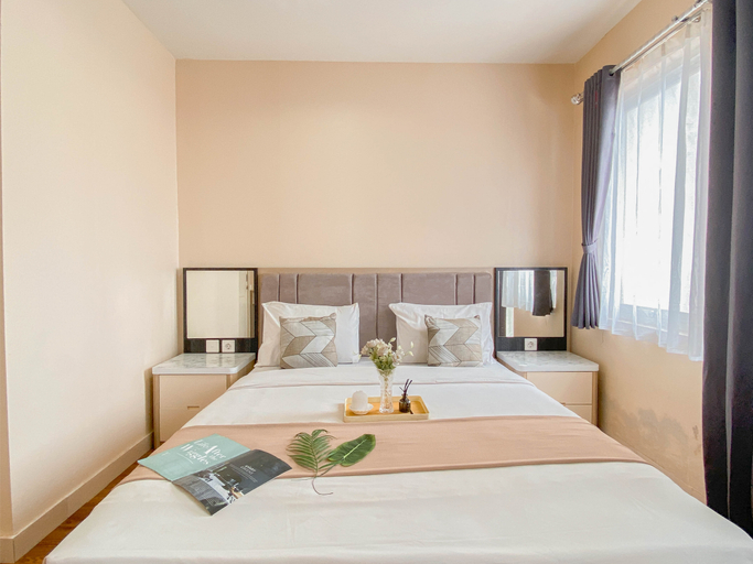 Bedroom 2, Warm and Cozy 1BR without Living Room at Sentul Tower Apartment By Travelio, Bogor