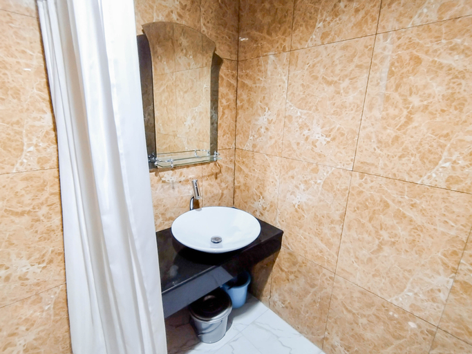 Bedroom 3, Stunning Studio with Strategic Location at Grand Sungkono Lagoon Apartment By Travelio, Surabaya