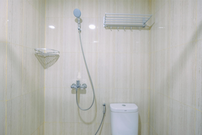 Bathroom 5, Comfort and Enjoy Living 2BR at Sentul Tower Apartment By Travelio, Bogor