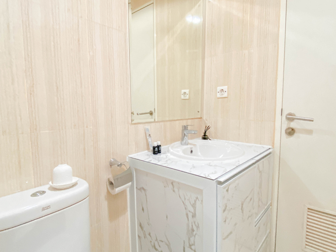 Bedroom 2, Warm and Cozy 1BR without Living Room at Sentul Tower Apartment By Travelio, Bogor