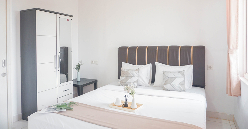 Bedroom 2, Cozy Living 1BR at Sentul Tower Apartment By Travelio, Bogor