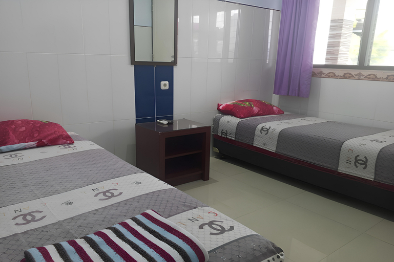 Hotel Orchid Syariah - Tap to explore photos