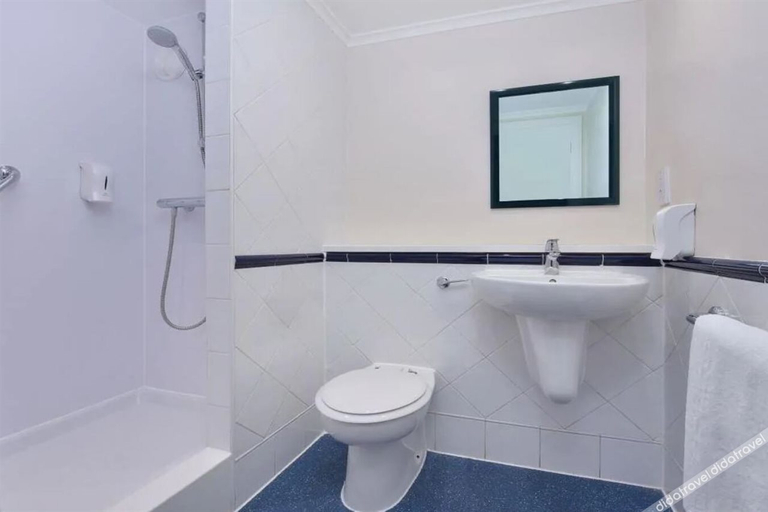 Bathroom 4, Travelodge Northampton Wootton, Northamptonshire