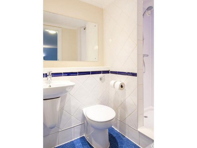 Bathroom 5, Travelodge Northampton Wootton, Northamptonshire