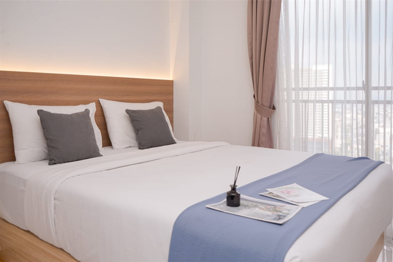 Minimalist Studio Room at Springwood Residence Tangerang Apartment By Travelio, Tangerang