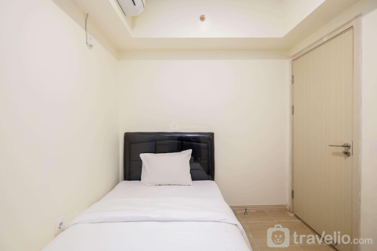 Bedroom 2, Comfort Cozy 2BR at Meikarta Apartment By Travelio, Cikarang