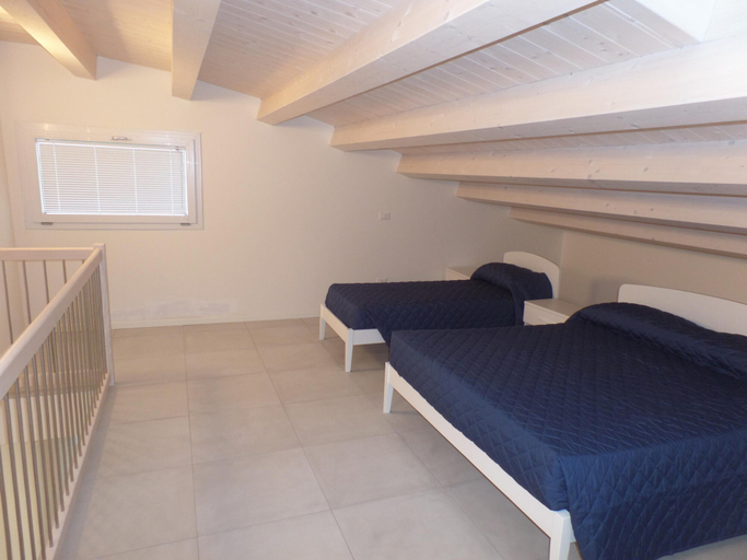 Room 3, Melograno C Mans in Bibione, Venezia