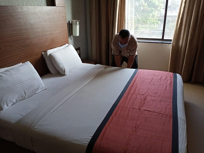 Bedroom 3, Hotel Sadanand Regency , Pune