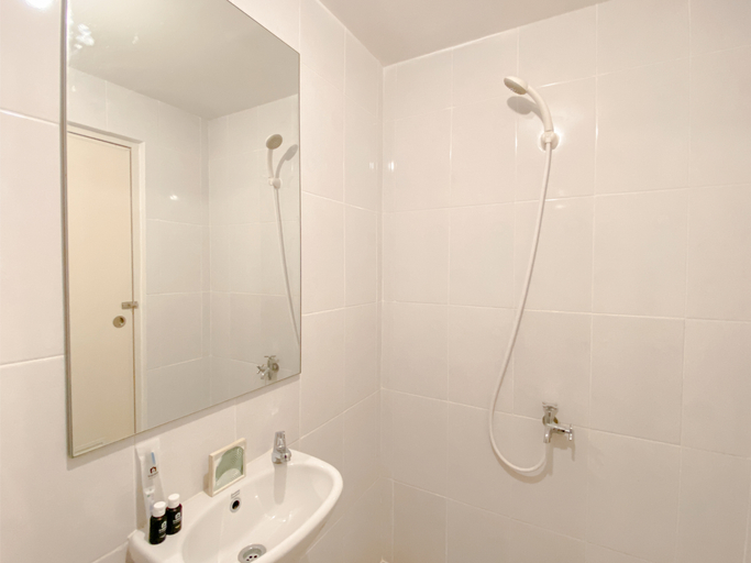 Bathroom 5, Cozy and Enjoy Studio at Tokyo Riverside PIK 2 Apartment By Travelio, Tangerang