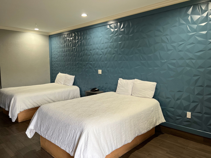 Bedroom 2, Symphony Inn and Suites, Houston
