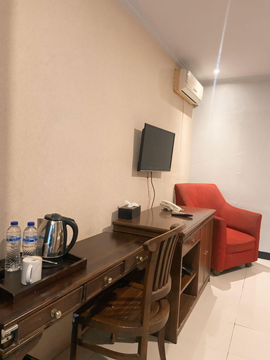 Rizen Premiere Hotel Cisarua - Tap to explore photos