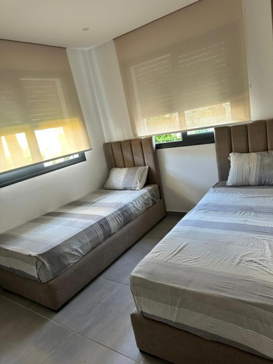 Others 3, Appartement avec grand jardin et acces direct a la piscine, Tétouan