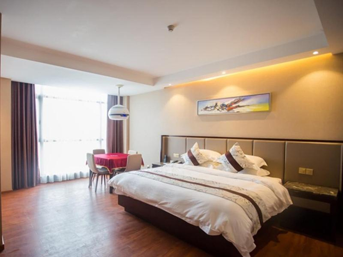 Bedroom 2, GreenTree Eastern YingTan Longhushan (N) Rd. Gym Hotel , Yingtan