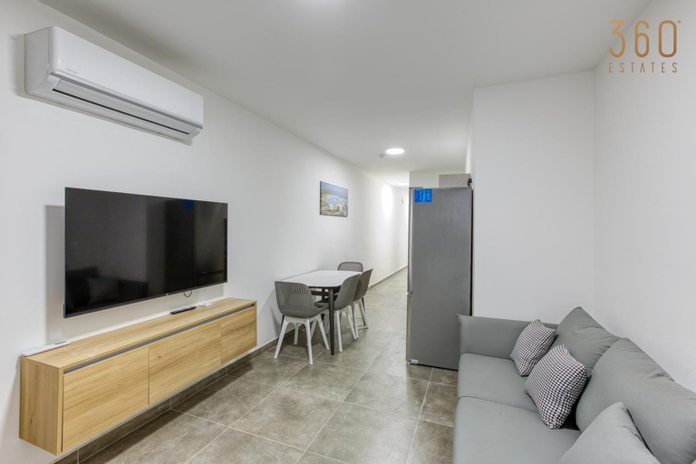 Shared lounge/TV area 2, St Pauls Bay Oasis Suites by 360 Estates, Saint Paul's Bay