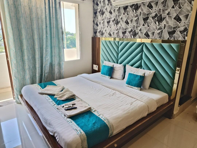 Bedroom 2, Hotel Sunrise N Resorts, Nagpur