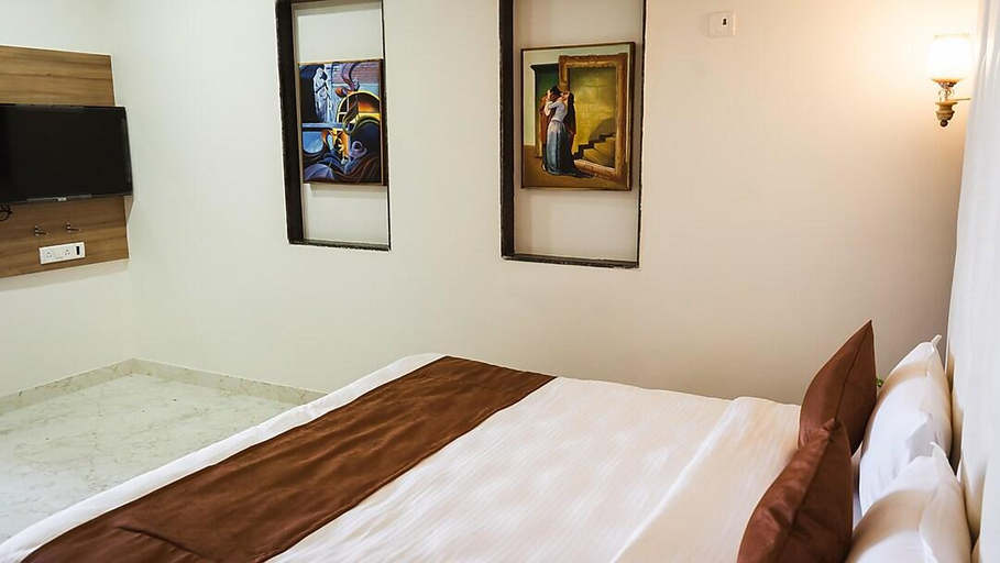 Bedroom 2, Hotel Satkar, Pune