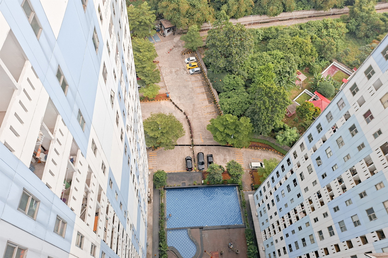 Warm and Cozy 2BR at Urbantown Serpong Apartment By Travelio, Tangerang Selatan