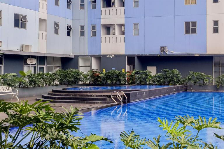 Warm and Cozy 2BR at Urbantown Serpong Apartment By Travelio