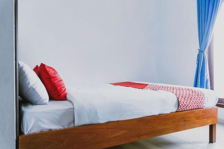 Bedroom, Super OYO 1565 Hotel Homiko, Pacitan