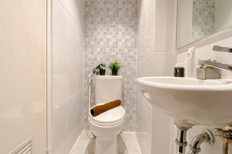 Bathroom 5, Neat and Warm Studio at Tokyo Riverside PIK 2 Apartment By Travelio, Tangerang