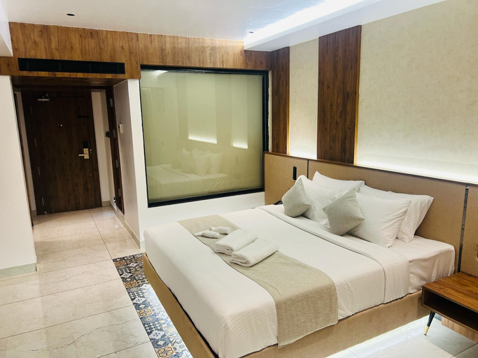 Bedroom 4, Royal Plaza Inn by RAK Rooms, Kozhikode