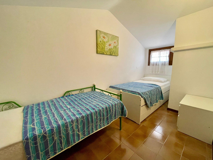 Bedroom 2, Beachside Holiday Home in Porto Santa, Venezia