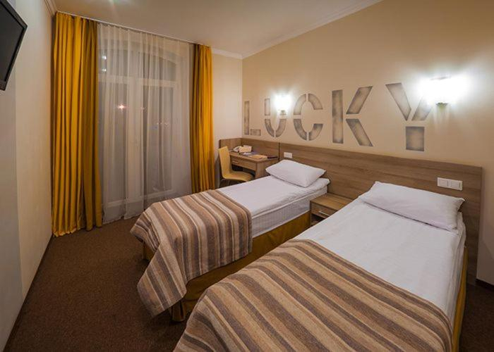 Bedroom, Raziotel Kyiv, Darnyts'kyi