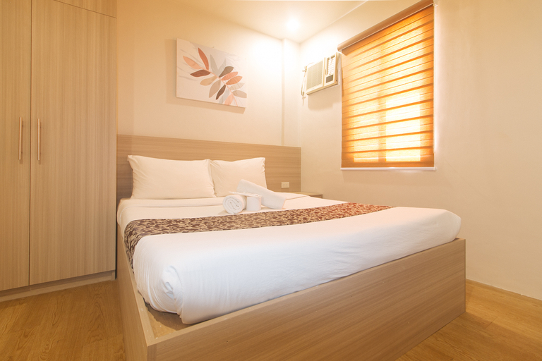Elyseah Condotel by RedDoorz - Tap to explore photos