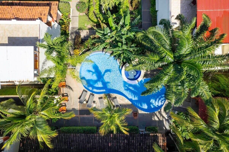 Exterior & Views, Modern Split-Level 2-Bedroom Condo with Pools, Terrace & Easy Beach Access, Carrillo