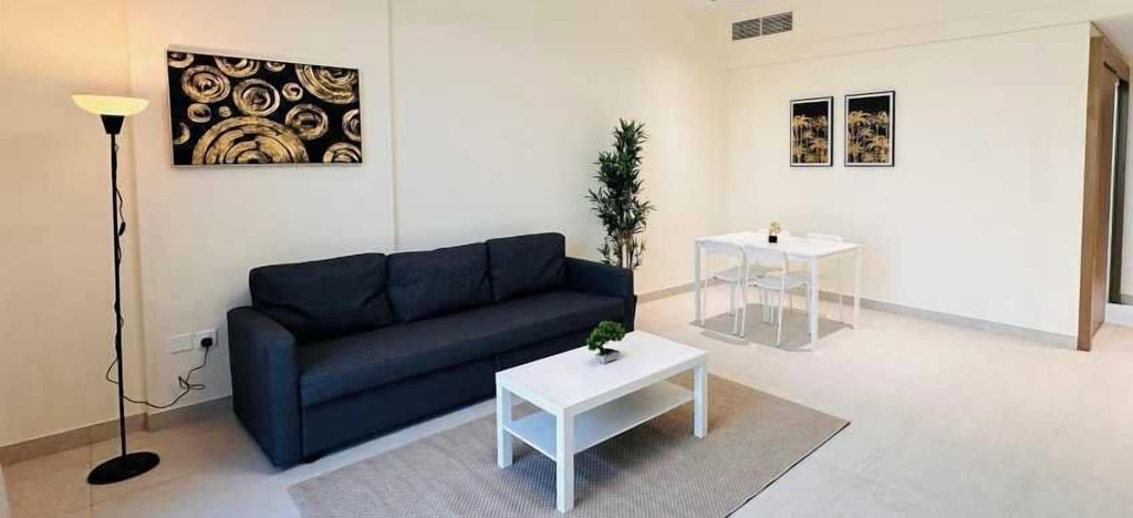 Room 5, OYO HOME 1458 Premium 1bed Apartment In Jvc Be1005, Dubai