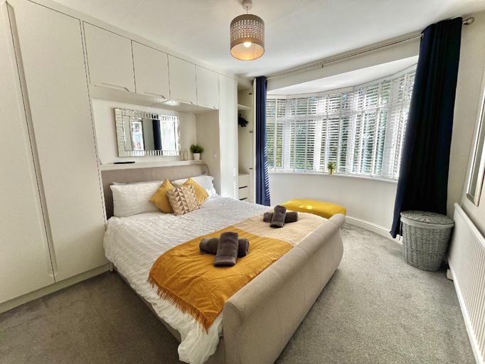 Bedroom 2, Stylish 3-bed home in Prestwich with free parking, Bury