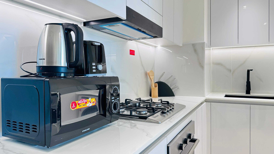 Room 3, OYO HOME 1458 Premium 1bed Apartment In Jvc Be1005, Dubai