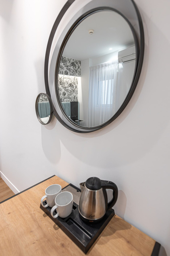 Room 3, Kriel Suites by LIV Homes Room 103, Attica