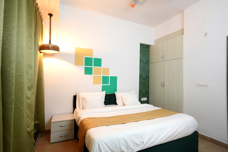Bedroom 3, Nimantrana Hotel & Suites, Gautam Buddha Nagar