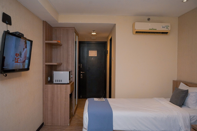 Bedroom, Warm and Minimalist Studio (No Kitchen) at Great Western Apartment, Tangerang