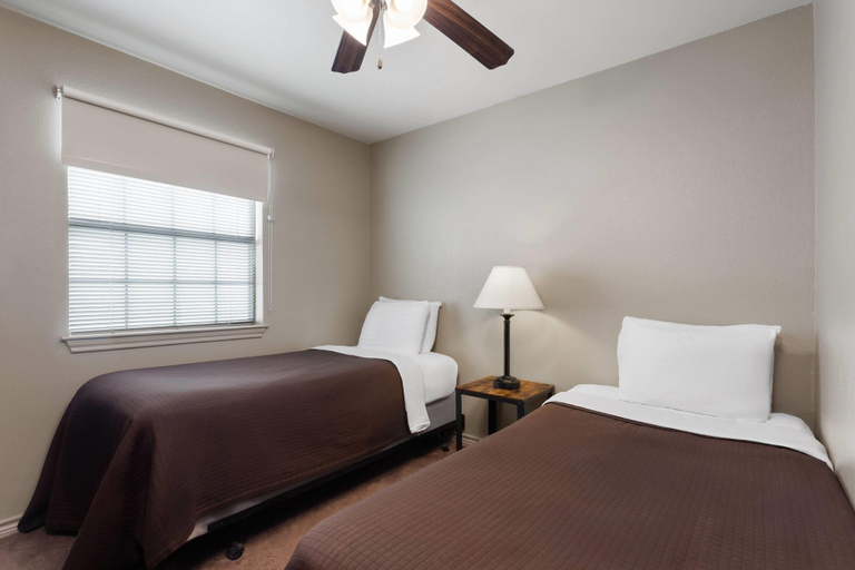 Bedroom 4, Eagle's Den Suites Big Spring a Travelodge by Wyndham, Howard