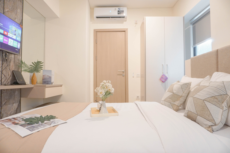 Bedroom 2, Homey and Minimalist Studio Apartment Meikarta By Travelio, Cikarang