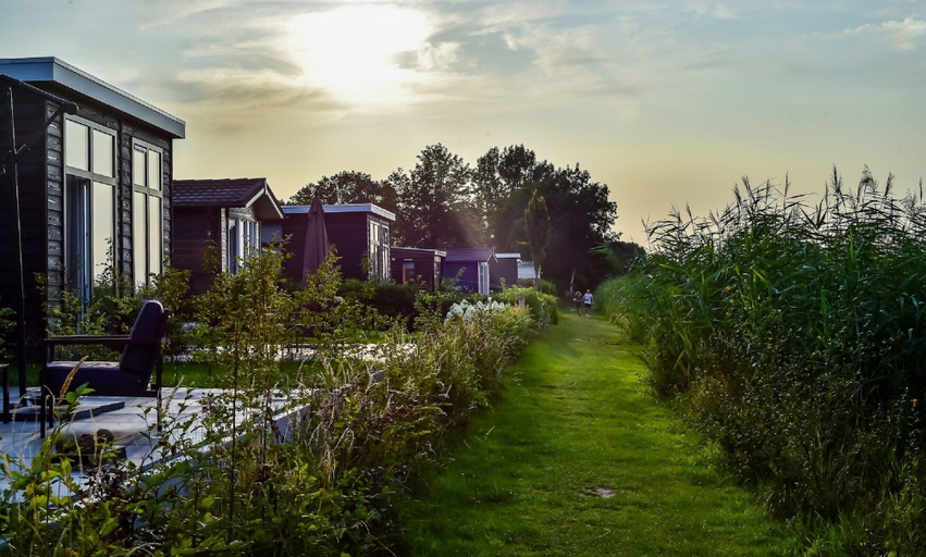 Exterior 4, Fine Chalet near Water with Woodfired Hot Tub, Wierden