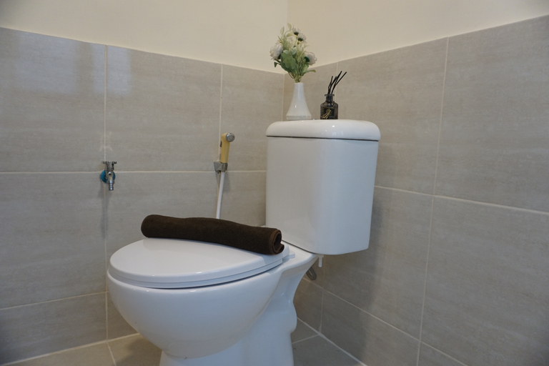 Bathroom 5, Homey and Minimalist Studio Apartment Meikarta By Travelio, Cikarang