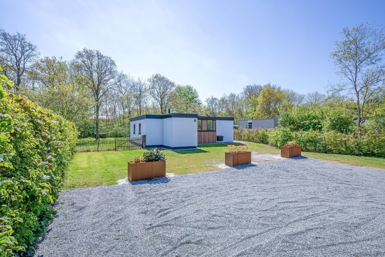 Garden, Cozy Holiday Home With hot tub on Texel, Texel