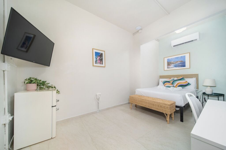 Bedroom 3, Room 15: Skyline Sips & Santurce Charm