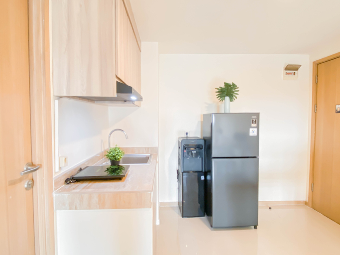 Others 4, Spacious 3BR with Neutral Toned at Meikarta Apartment By Travelio, Cikarang